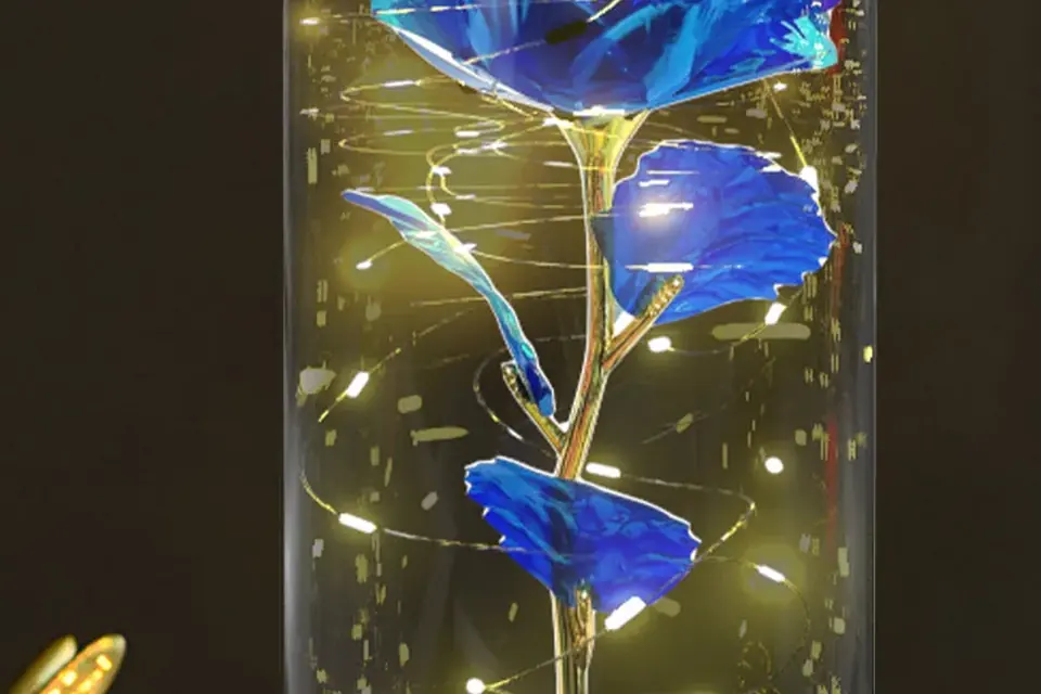 Bluetooth Rose Speaker Lamp close-up with warm lights around the rose inside the glass dome