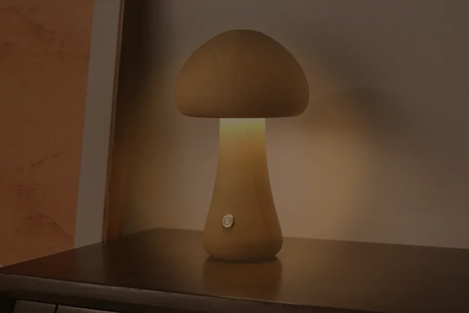 Cauora Mushroom Glow Night Light on a narrow bedside surface