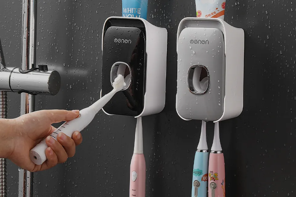 Cauora Quiet Routine Toothpaste Dispenser keeping a bathroom counter clear